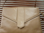 Sac-Pochette Charles Jourdan, beige poudré.