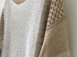 Pull nuancé beige.