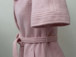 Veste rose pastel.