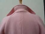 Veste rose pastel.