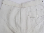 Pantalon cuir blanc.