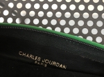 Sac Charles Jourdan, vert acidulé et noir.